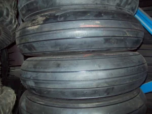20.5X6.75-10 RECHAPE LIGNE TL